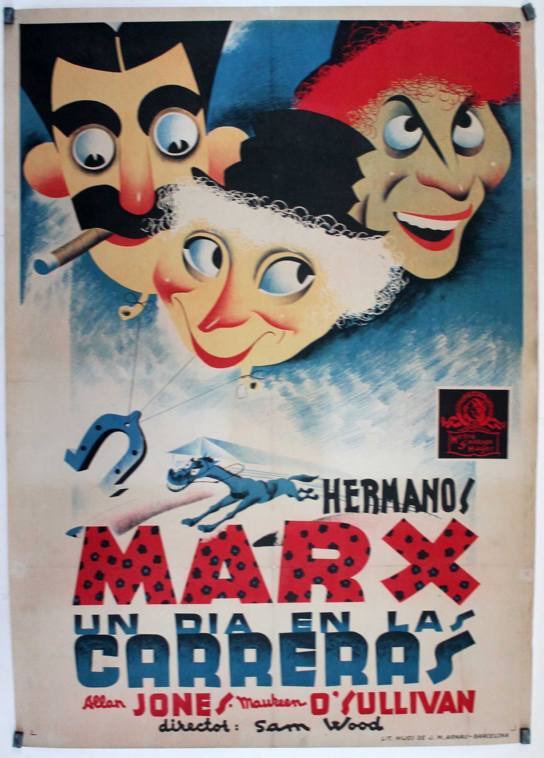 DIA EN LAS CARRERAS, UN
